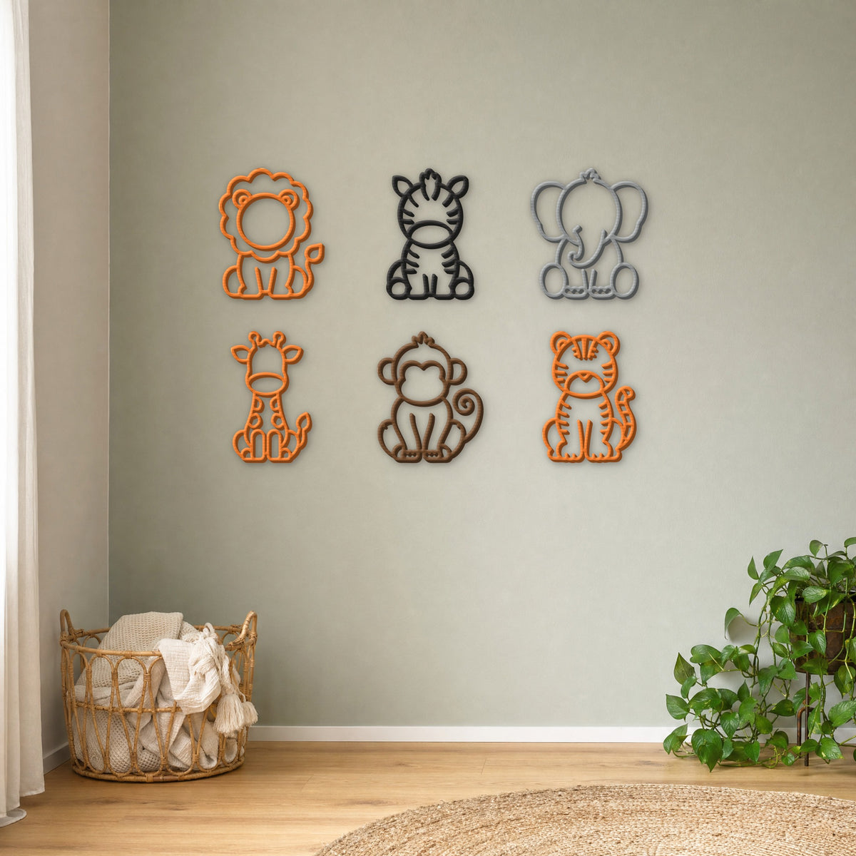 All six 3D printed safari animal wall art designs grouped on a nursery wall