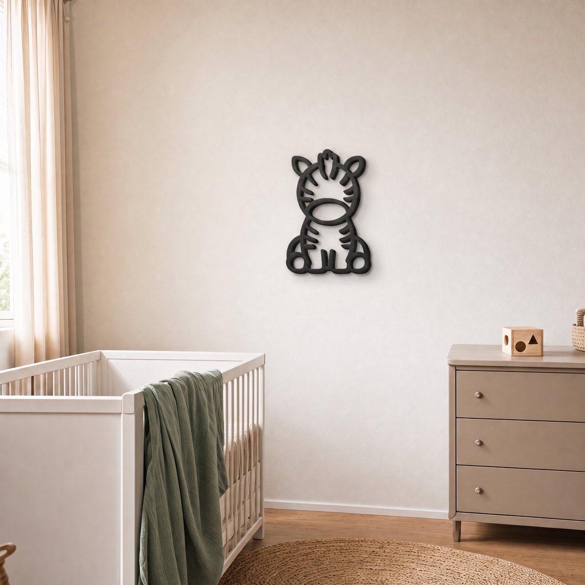 Black 3D printed zebra wall art in a nursery with cot and drawers