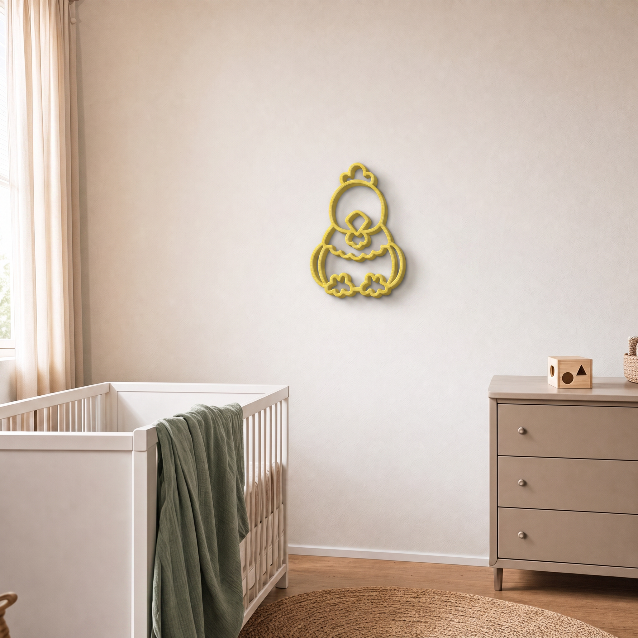 Yellow 3D printed chicken wall art in a nursery with cot and drawers