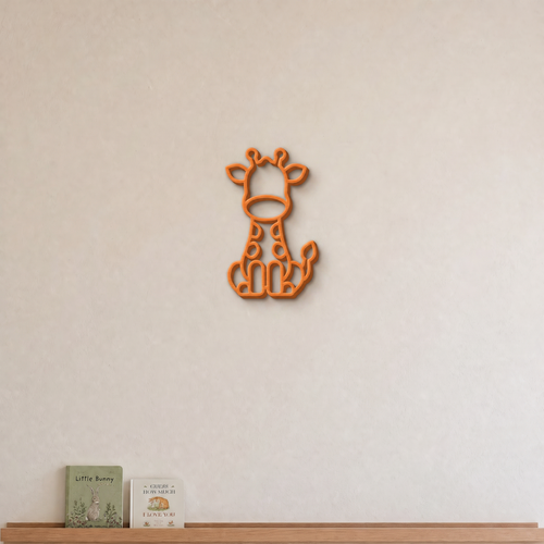 Giraffe nursery wall art in orange, 3D printed outline on a nursery wall