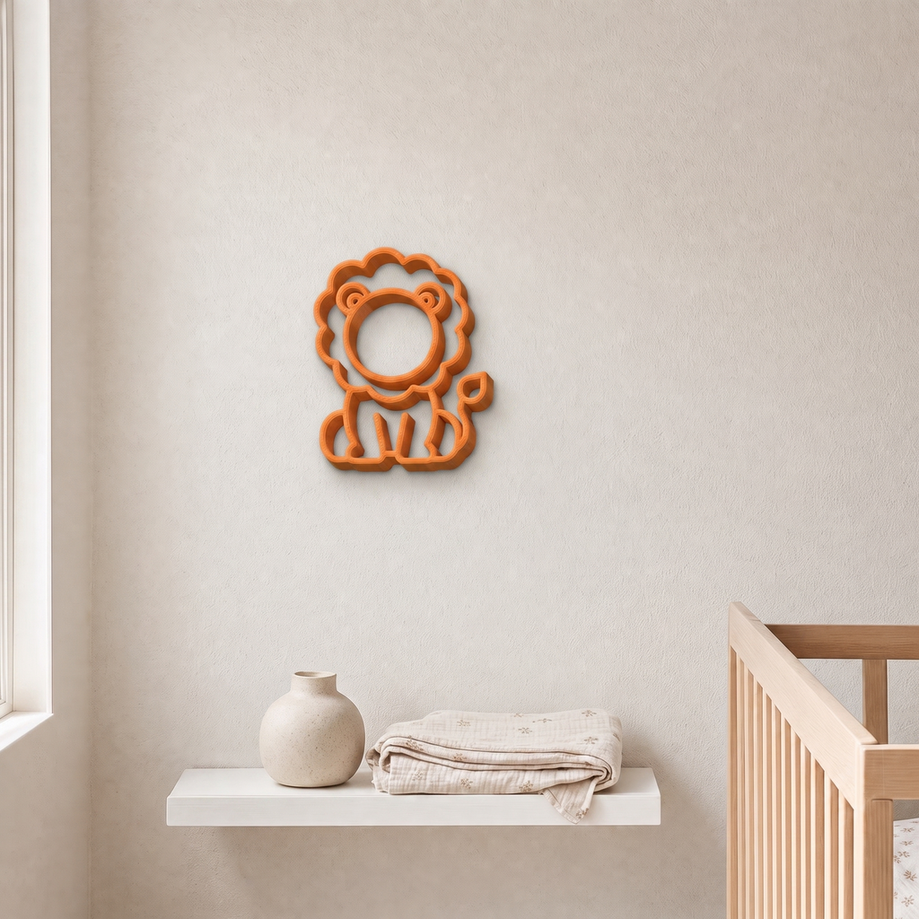 Orange 3D printed lion wall art above a nursery shelf