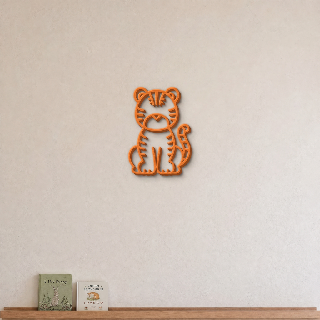 Tiger nursery wall art in orange, 3D printed striped outline on a nursery wall