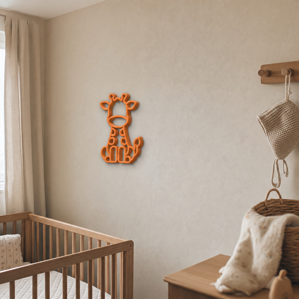 Orange giraffe wall art beside a wooden peg rail in a nursery