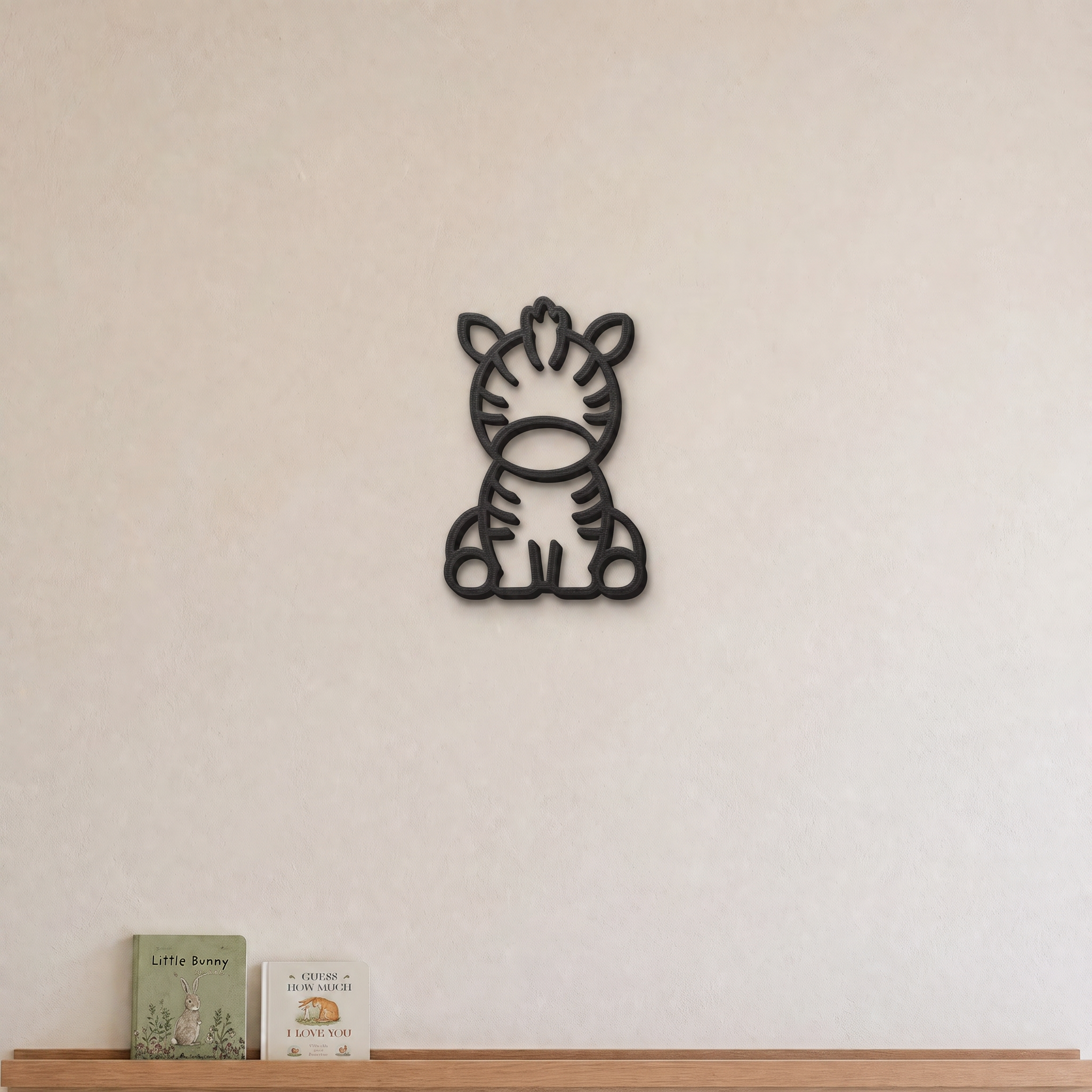 Zebra nursery wall art in black, 3D printed striped outline on a nursery wall