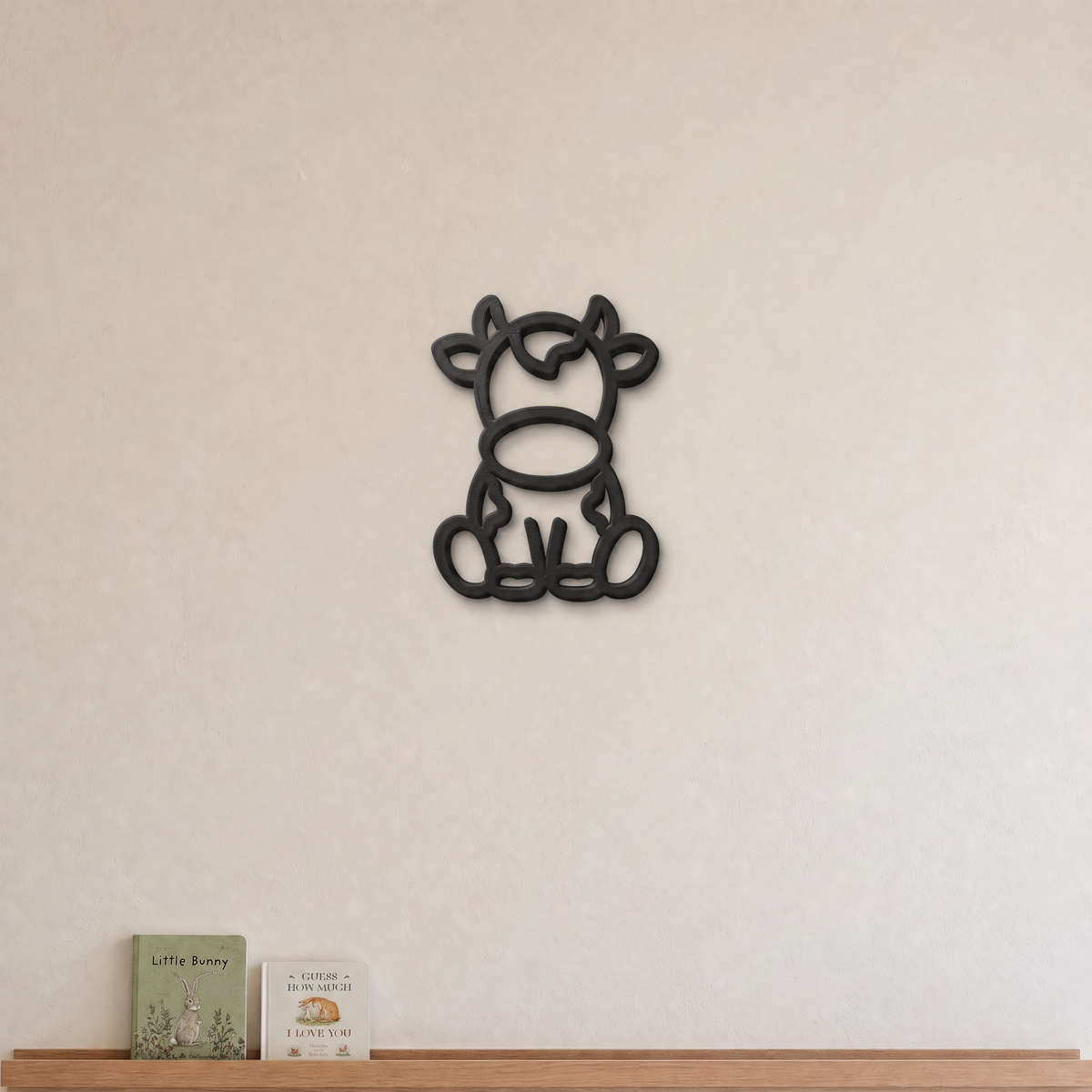 Cow nursery wall art in black, 3D printed outline on a nursery wall